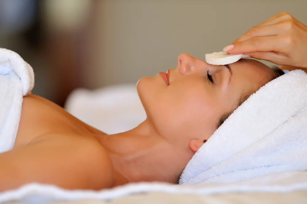 Profile,View,Of,A,Happy,Young,Woman,Preparing,For,Cosmetic